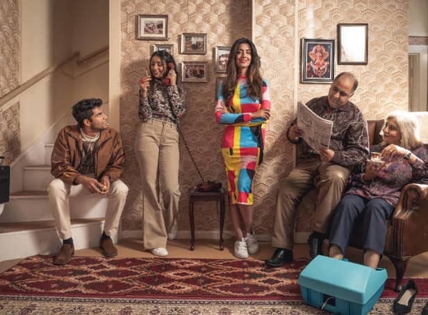 <p>The Sharma family from Solihull and presenter Noreen Khan on BBC Back in Time for Birmingham</p>