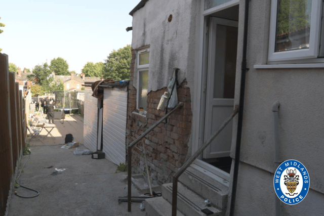 The outhouse where weapons were found at the home of Azim and Noweed Hussain in Small Heath