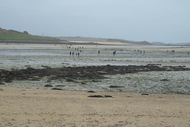John Chatterton on the low tide crossing Tresco to Bryher, Scilly Isles