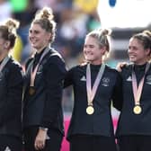  The New Zealand team celebrate on the podium after the Women's Gold Medal match between Australia and New Zealand 