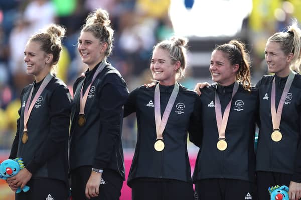  The New Zealand team celebrate on the podium after the Women's Gold Medal match between Australia and New Zealand 