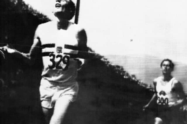 British runner Roger Bannister (L) winning the race ahead of Australian competitor John Landy (R) during the British Empire and Commonwealth Games in Vancouver