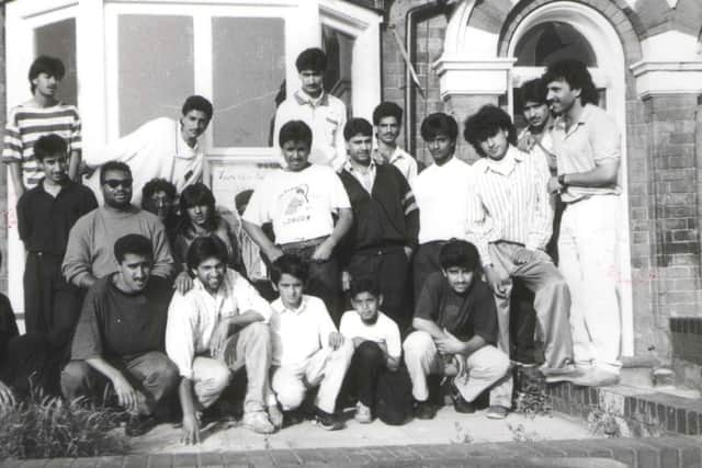 Saathi House group photo outside the building in Aston in the 1980s