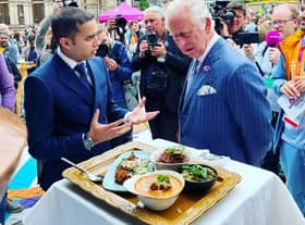 Prince Charles and  Asha’s manager Nouman Farooqui at the restaurant’s in Victoria Square