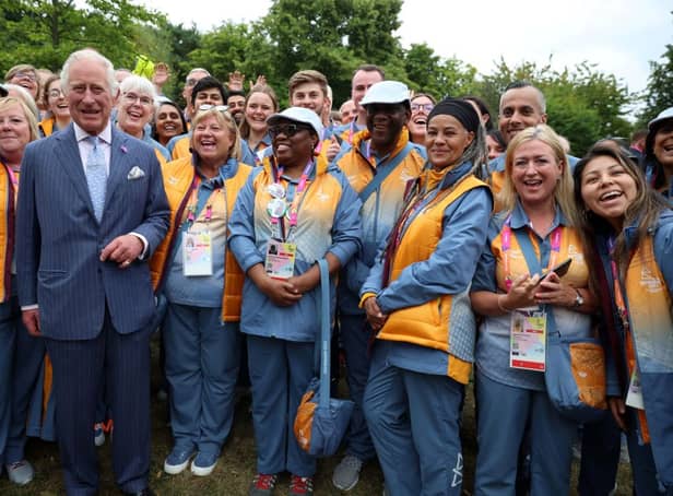 <p>Prince Charles, Prince of Wales poses for pictures with Commonwealth Games volunteers during a visit to the Athletes Village at The University of Birmingham</p>