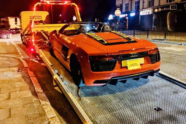 Police seized an Audi R8 - worth around £130k - after it was heard 'racing around' Hall Green