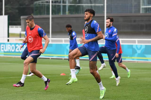 Conor Coady and Tyrone Mings of England in action during an England training session at St George’s Park