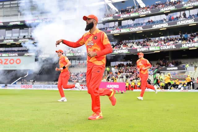 Moeen Ali of the Birmingham Phoenix leads his team out to field during The Hundred match between Birmingham Phoenix Men and Trent Rockets Men at Edgbaston on August 01, 2021 in Birmingham, England. (Photo by Nathan Stirk - ECB/ECB via Getty Images)