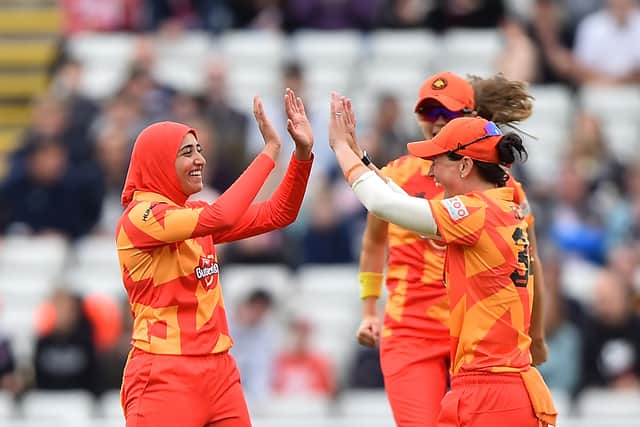 Abtaha Maqsood of the Birmingham Phoenix celebrates with team mates after dismissing Sammy-Jo Johnson of the Trent Rockets during The Hundred match between Birmingham Phoenix Women and Trent Rockets Women at Edgbaston on August 01, 2021 in Birmingham, England. (Photo by Nathan Stirk - ECB/ECB via Getty Images)