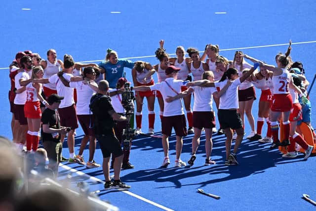 Team England celebrate their win at the end of the women’s gold medal hockey. (Photo by PAUL ELLIS/AFP via Getty Images)