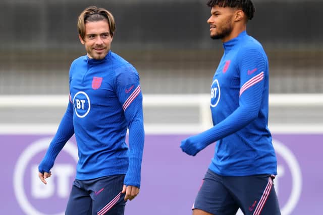 Jack Grealish and Tyrone Mings of England during an England training session at St Georges Park on September 01, 2021 in Burton-upon-Trent, England. (Photo by Catherine Ivill/Getty Images)