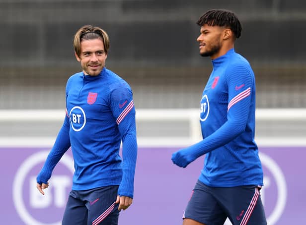 <p>Jack Grealish and Tyrone Mings of England during an England training session at St Georges Park on September 01, 2021 in Burton-upon-Trent, England. (Photo by Catherine Ivill/Getty Images)</p>