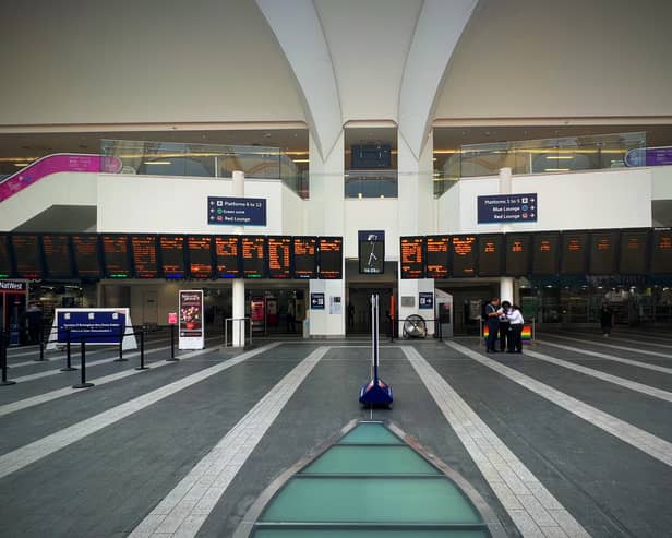 Birmingham New Street empty concourse departure boards during June 2022 strikes