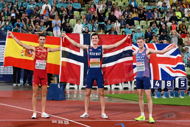 orway's Jakob Ingebrigtsen (centre) celebrates after winning the Men's 1500m final alongside Great Britain's Jake Heyward (right) who finished second and Mario Garcia who finished third during day eight of the European Championships 2022 in Munich, Germany. Picture date: Thursday August 18, 2022.