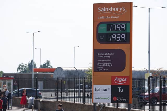 Fuel prices at a Sainsburys petrol station and supermarket on July 24, 2022 in London, England. (Photo by Hollie Adams/Getty Images)