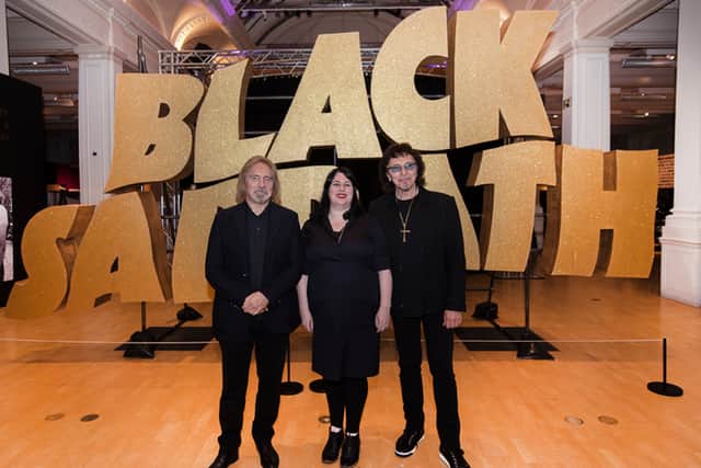 Lisa Meyer with Black Sabbath’s Tommy Iommi and Geezer Butler during the exhibition in 2019 