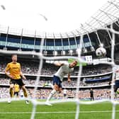 Harry Kane of Tottenham Hotspur scores their sides first goal past Jose Sa of Wolverhampton  (Photo by Clive Mason/Getty Images)