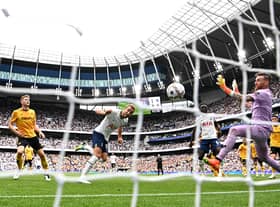 Harry Kane of Tottenham Hotspur scores their sides first goal past Jose Sa of Wolverhampton  (Photo by Clive Mason/Getty Images)
