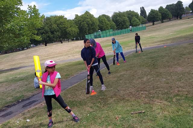 Young girls take part in cricket tournament