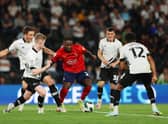 Reyes Cleary of West Bromwich Albion is surrounded by Derby County players during the Carabao Cup Second Round match between Derby County and West Bromwich Albion at Pride Park Stadium