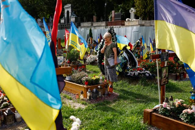  Dignitaries and family's attend a ceremony for the fallen soldiers of Ukraine on the Field of Mars on August 24, 2022 in Lviv, Ukraine. (Photo by Jeff J Mitchell/Getty Images)