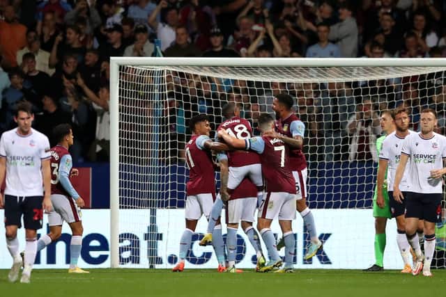Danny Ings of Aston Villa celebrates scoring his teams 2nd goal during the Carabao Cup Second Round match between Bolton Wanderers and Aston Villa at University of Bolton Stadium