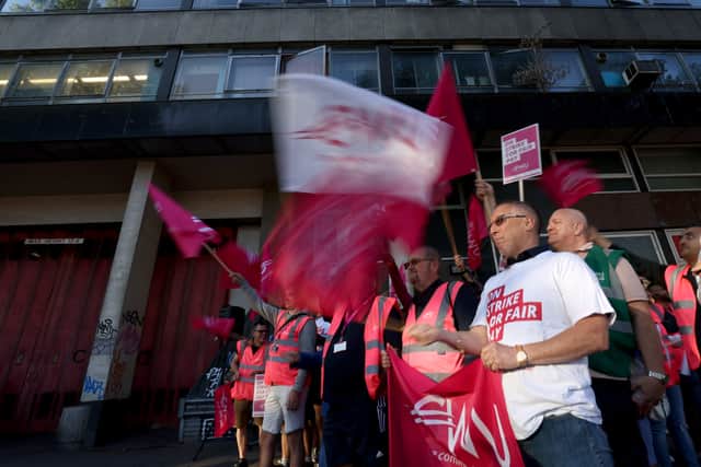Postal workers from the Communication Workers Union on the picket line at the Royal Mail Whitechapel Delivery Office in London (Photo: PA)