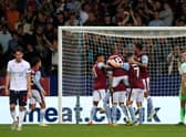 Danny Ings of Aston Villa celebrates scoring his teams 2nd goal during the Carabao Cup Second Round match between Bolton Wanderers and Aston Villa