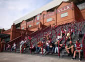 Fans arrive at the stadium prior to the Premier League match between Aston Villa and West Ham United at Villa Park