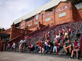 Fans arrive at the stadium prior to the Premier League match between Aston Villa and West Ham United at Villa Park
