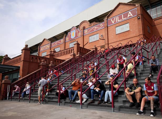 <p>Fans arrive at the stadium prior to the Premier League match between Aston Villa and West Ham United at Villa Park</p>