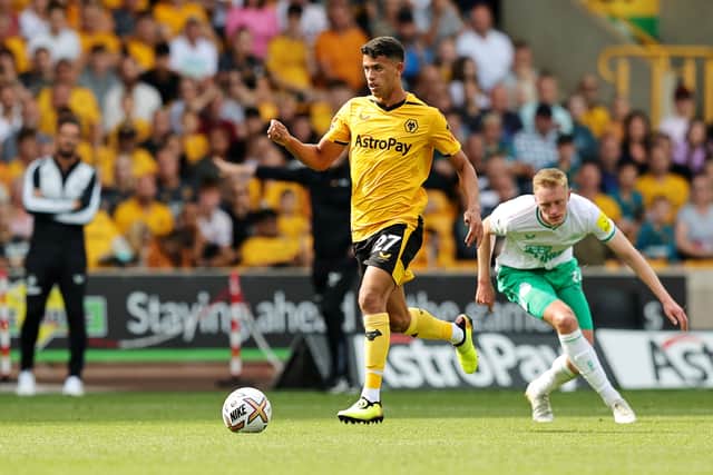 Matheus Nunes of Wolverhampton Wanderers runs with the ball  during the Premier League match between Wolverhampton Wanderers and Newcastle United at Molineux