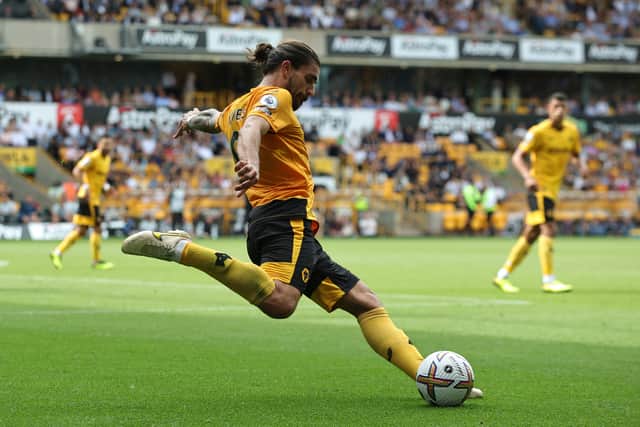 Ruben Neves of Wolverhampton Wanderers passes the ball during the Premier League match between Wolverhampton Wanderers and Newcastle United at Molineux