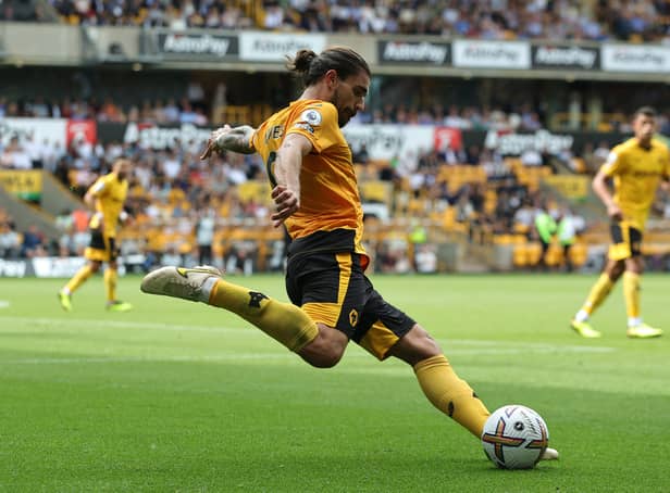 <p>Ruben Neves of Wolverhampton Wanderers passes the ball during the Premier League match between Wolverhampton Wanderers and Newcastle United at Molineux</p>