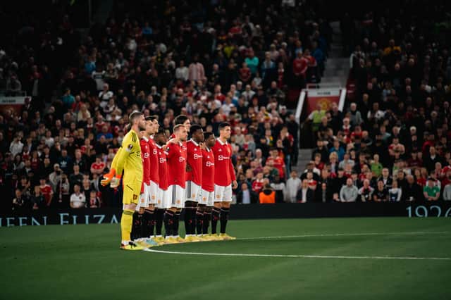 A minute silence for Queen Elizabeth II was held ahead of Manchester United’s home match at Old Trafford. Credit: Getty. 