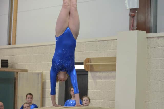 She previously trained 20 hours a week and competed in national gymnastics competitions before a freak accident put a stop to it