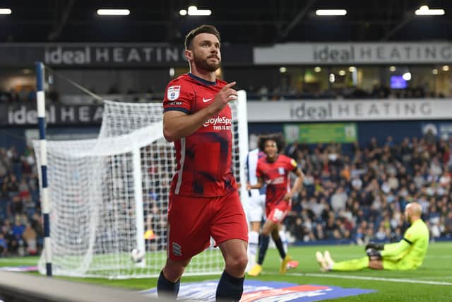Scott Hogan of Birmingham City celebrates scoring his hat-trick and his sides third goal during the Sky Bet Championship between West Bromwich Albion and Birmingham City at The Hawthorns on September 14, 2022 in West Bromwich, England. (Photo by Tony Marshall/Getty Images)