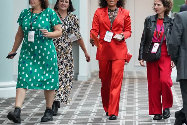 Former Spice Girl Melanie Brown (centre) arrives at the Conservative Party annual conference in Birmingham