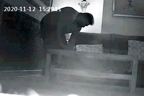 Stalker neighbour William Nolan caught on camera retrieving listening devices he planted in a Birmingham home