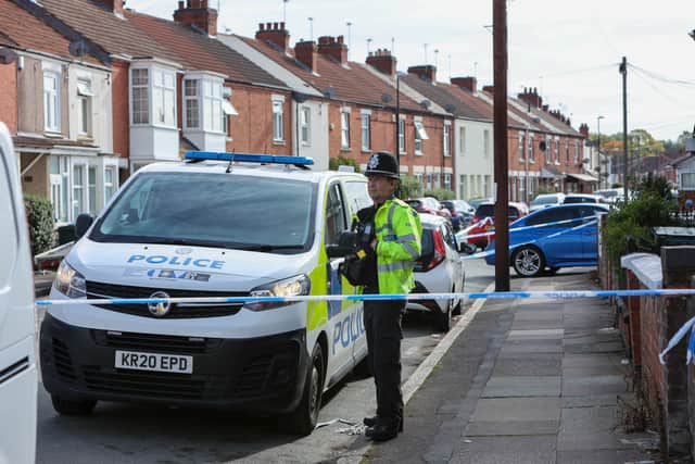 Police at the scene at Queen Mary’s Road in Coventry after a 52-year-old man was stabbed to death during a mass knife brawl outside a mosque.