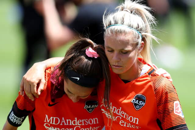 SANDY, UTAH - JULY 26: Shea Groom #6 and Rachel Daly #3 of Houston Dash hug after the Dash defeat the Chicago Red Stars in the championship game of the NWSL Challenge Cup at Rio Tinto Stadium on July 26, 2020 in Sandy, Utah. (Photo by Maddie Meyer/Getty Images)