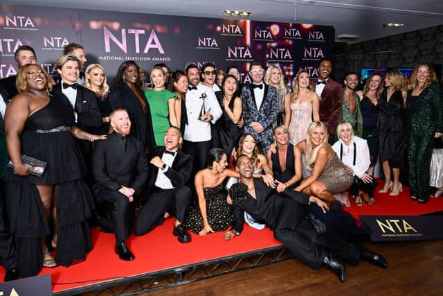 The cast and crew 'Strictly Come Dancing' with the Best Talent Show award in the winners' room at the National Television Awards 2022 at OVO Arena Wembley on October 13, 2022 in London, England. (Photo by Gareth Cattermole/Getty Images)