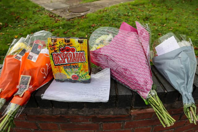 Floral tributes left near the scene at Washington Drive, Handsworth Wood, Birmingham, for Jamie Benbow