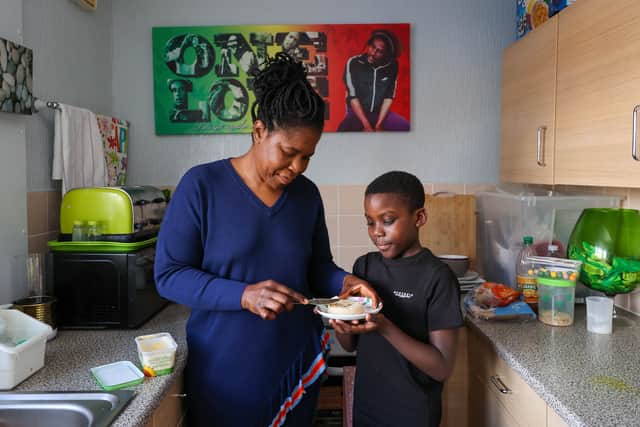 Christine Borton with her son Dayjanta Samuels at their home in Wednesbury