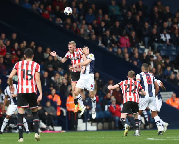 Oli McBurnie was dominant in the air - both in attack and in defence - as West Brom lost 2-0 to Sheffield United.