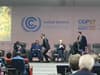 Rishi Sunak runs off stage and is rushed out of room by aides at COP27 in Egypt