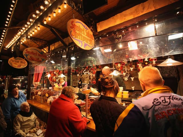 Visitors and Christmas shoppers enjoy Birmingham's Frankfurt Christmas market