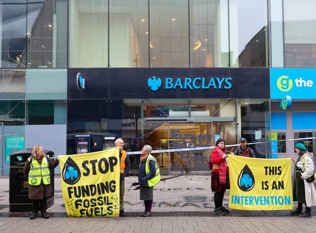 Climate activists from Extinction Rebellion covered the Barclays bank with black paint on High Street, Birmingham city centre