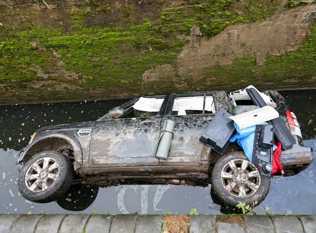 <p>Luxury Land Rover found in a canal lock in Tipton</p>