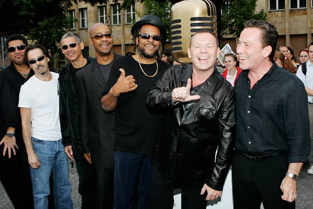 Singer Ali Campbell (2nd R), his brother Robin Campbell (R) and their band UB40 attend  the German Radio Awards 2005 at the Tempodrom Hall September 2, 2005 in Berlin, Germany